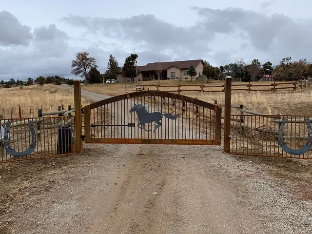 Gates & Automation fence by AgriTek — installation example