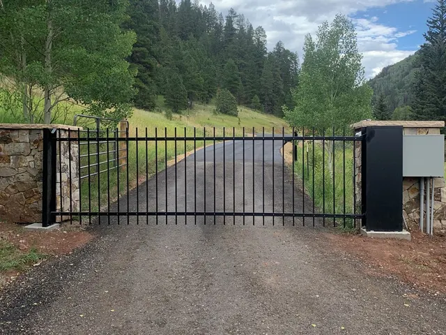 Gates & Automation fence by AgriTek — installation example